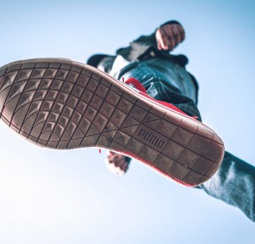 person wearing puma shoe