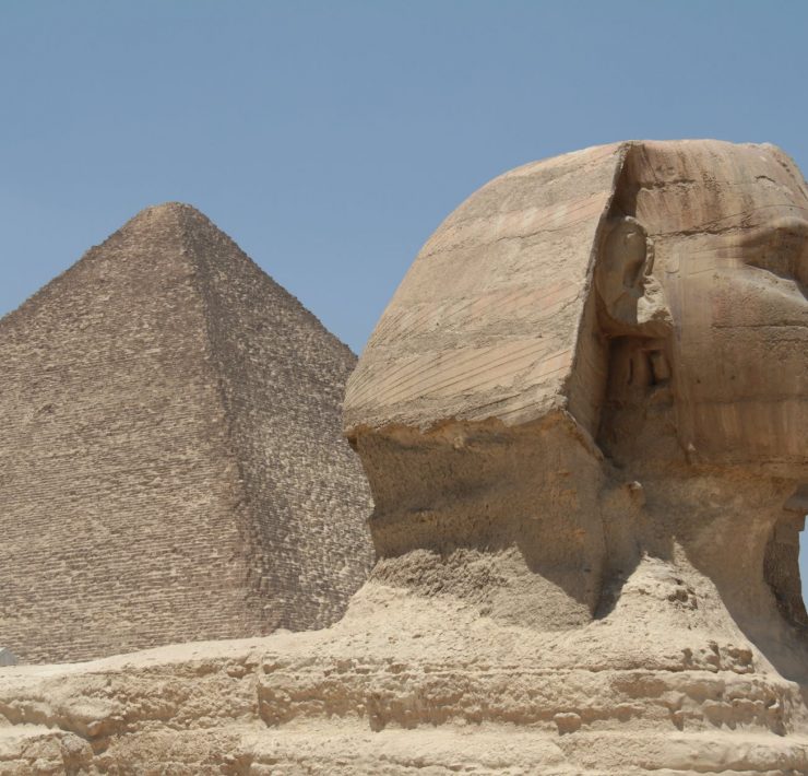 brown concrete pyramid under blue sky