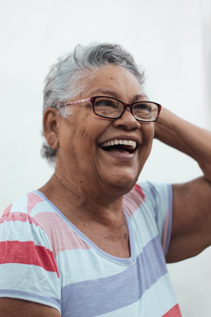 cheerful elderly woman looking away