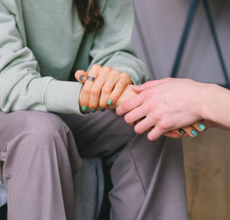 crop psychologist supporting patient during counseling indoors