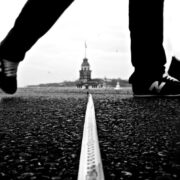 close up of man crossing border on ground