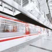 blurred motion of illuminated railroad station in city