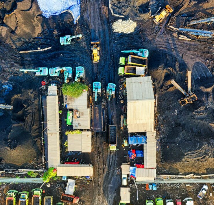top view shot of trucks on a construction site