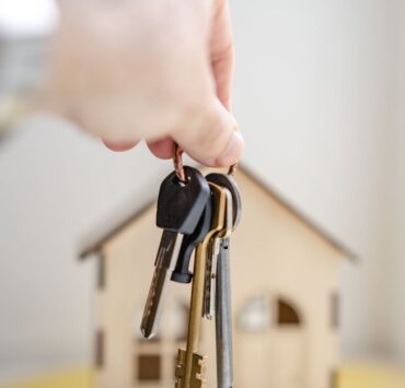 person with keys for real estate
