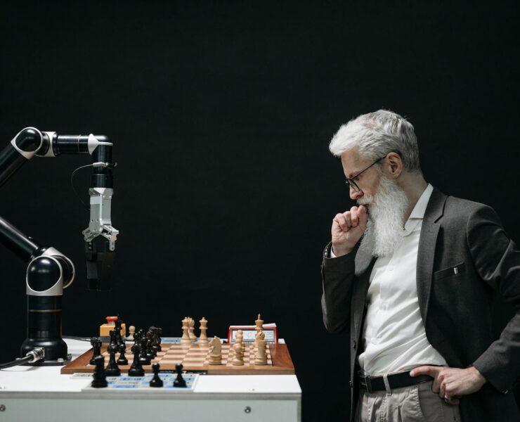 elderly man thinking while looking at a chessboard