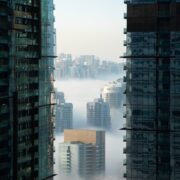 high rise buildings covered with fog